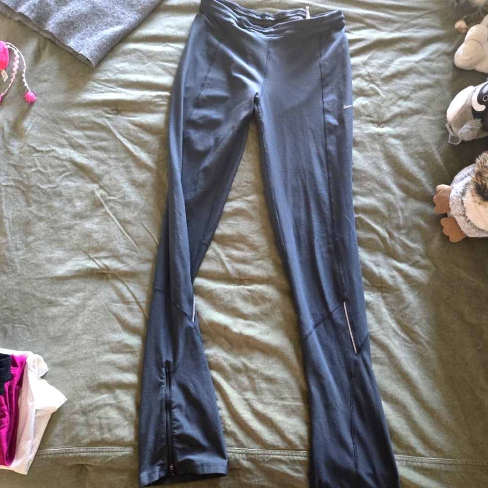 Nike DriFit women's long leggings.  Good condition